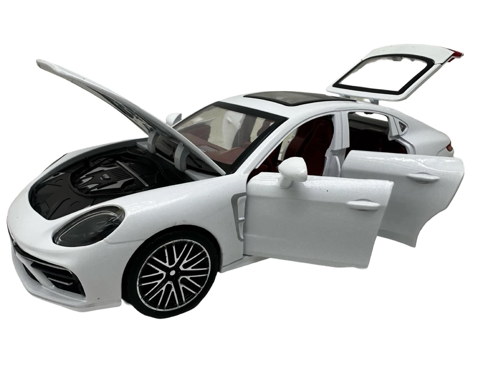 IMG-20250925-WA0024 Macheta Porsche Panamera alb 1/24 sunete lumini deschide usile si capotele