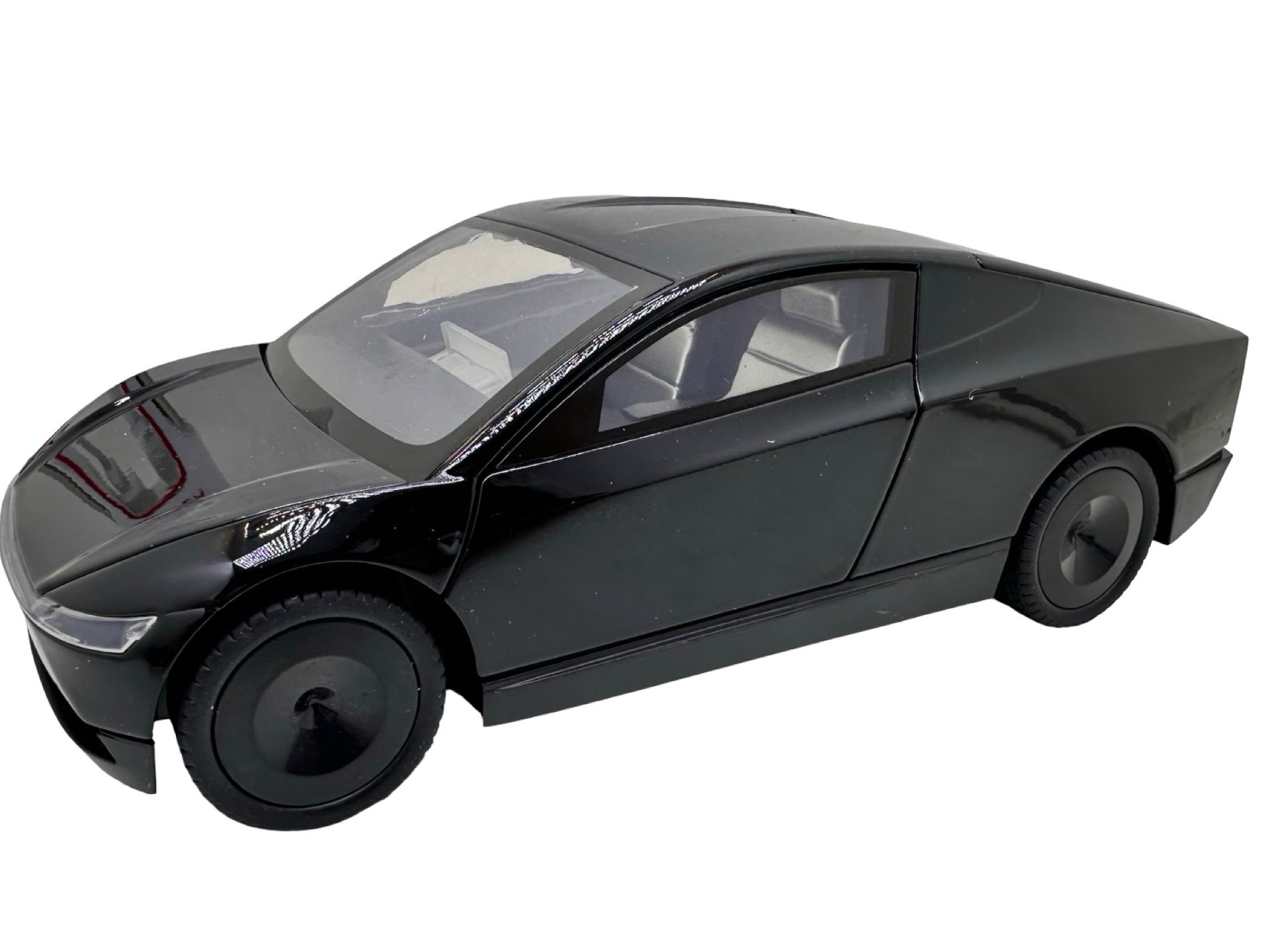 IMG-20251209-WA0259 Macheta Cybertruck Robotaxi negru1:24 replica metal lumini si sunete usi si capota functionale