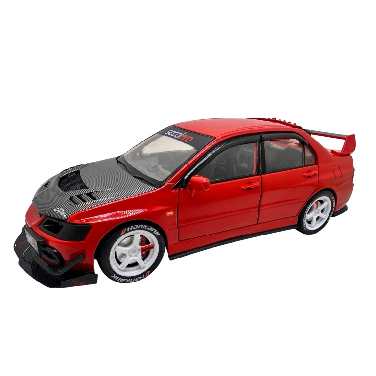 Macheta Mitsubishi Lancer Evo 9 rosu 1:24 replica metal lumini si sunete deschide usi capota si portbagaj